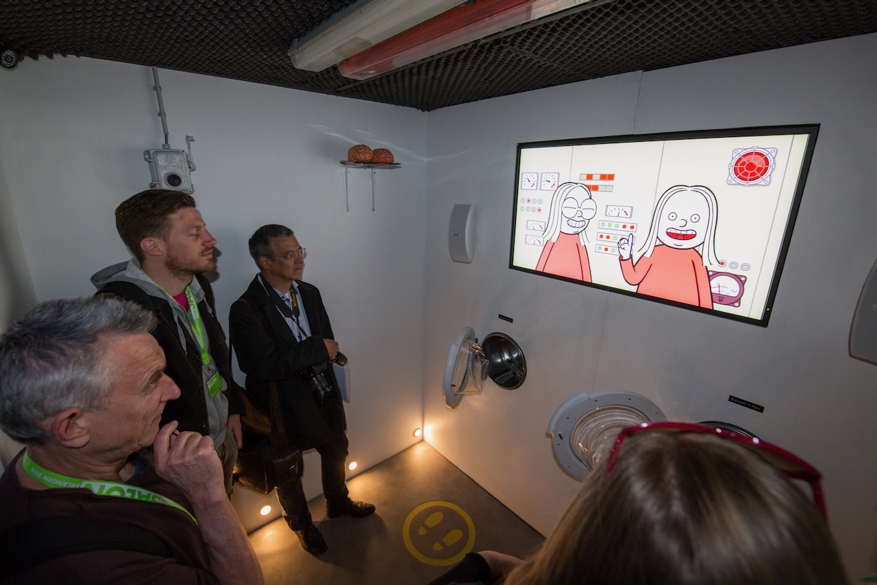 Upon entering the Experience, visitors are convincingly explained why they urgently need to undergo brainwashing.